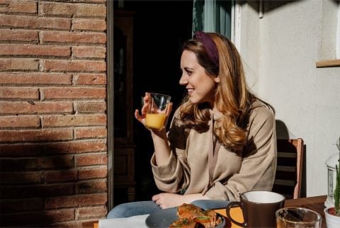 woman drinking juice