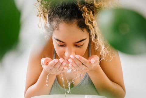 Woman Washing Her Face